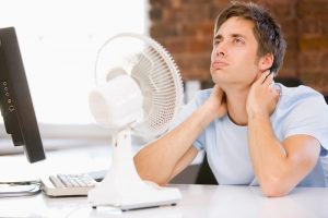 man-in-front-of-fan